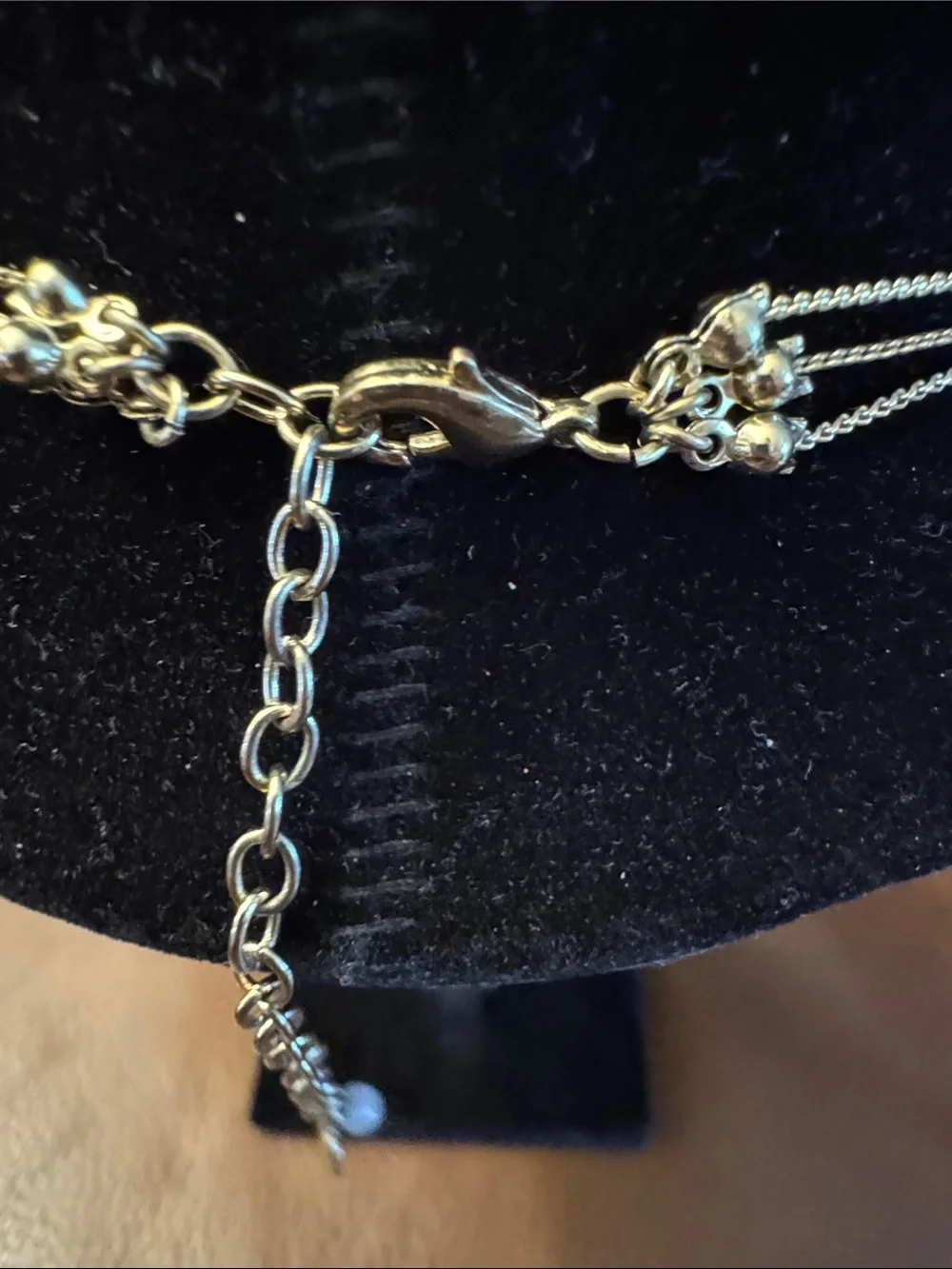 Betsey Johnson silver tone 3 strand necklace w/faux pearls, charms & rhinestones